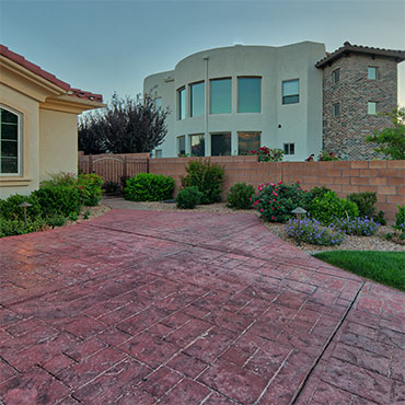 Colored and stamped concrete driveway.